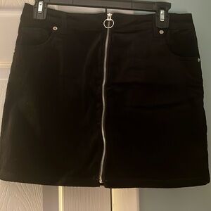 NWOT black corduroy mini skirt with zipper front